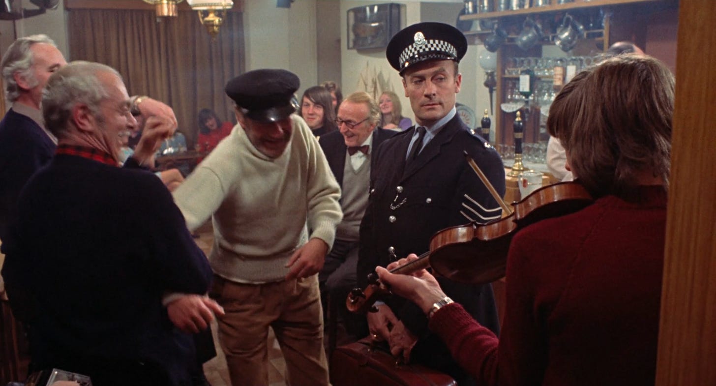 Sergeant Howie meets the residents of Summerisle at the pub in The Wicker Man
