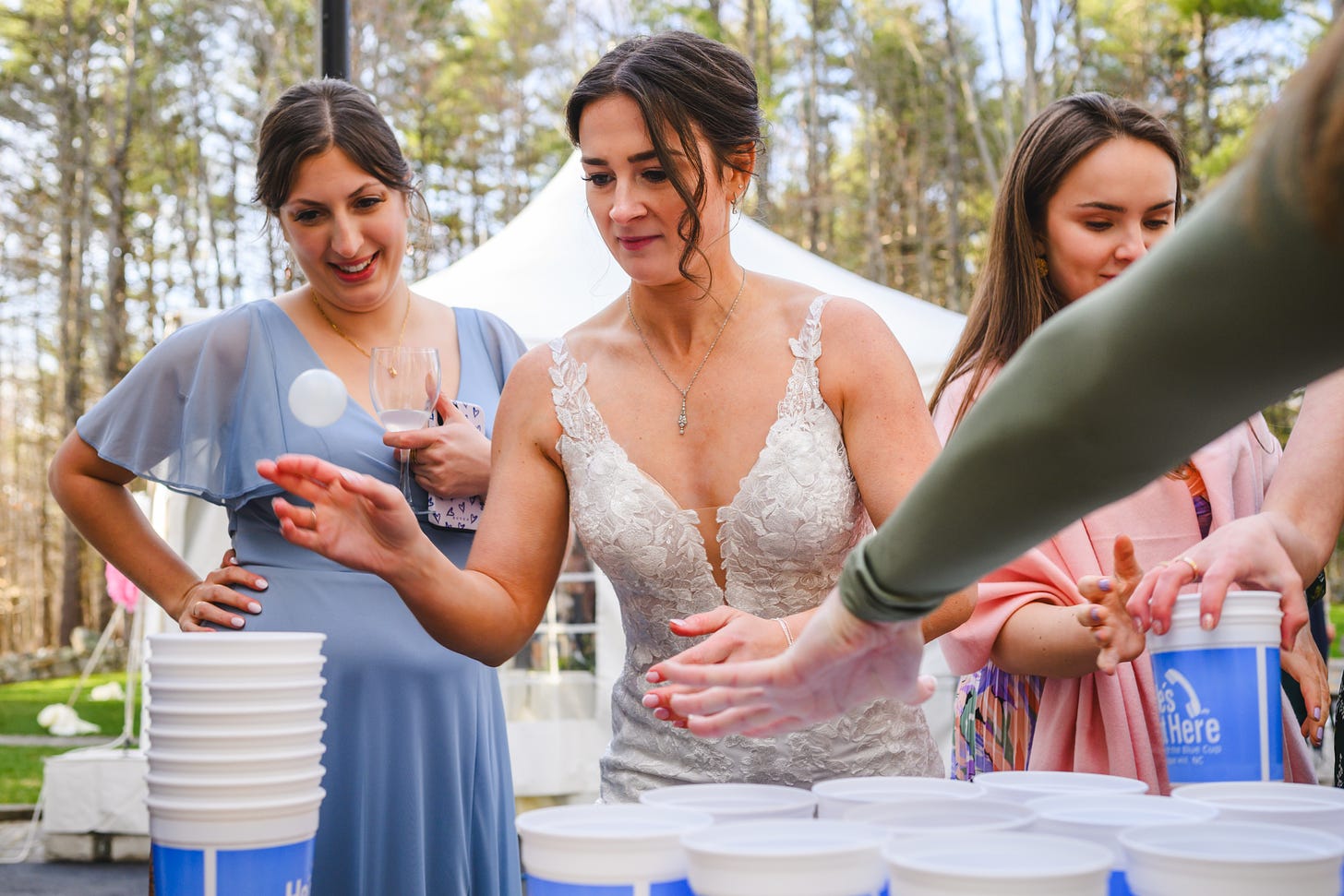 A bride playing stack cups
