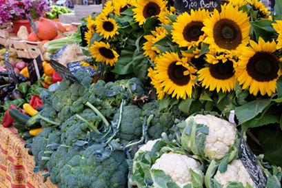 Flowers and produce at a farmer's market