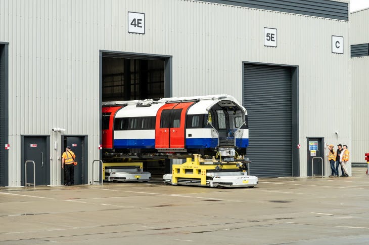 A Piccadilly line train emerging from a shed