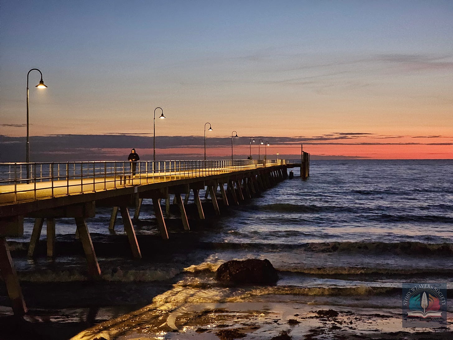 A lone runner on the jetty at sunset.