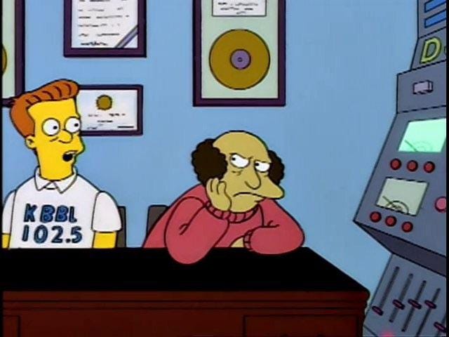 r/TheSimpsons - cartoon characters sitting at a desk