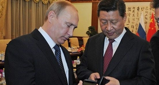 http://blogs.wsj.com/chinarealtime/2014/11/10/vladimir-putin-gives-xi-jinping-a-russian-yotaphone-2-as-gift/