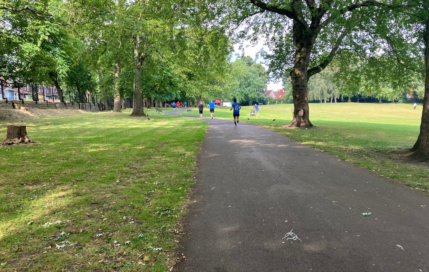 A wide path uphill to the finish (or completing a lap)