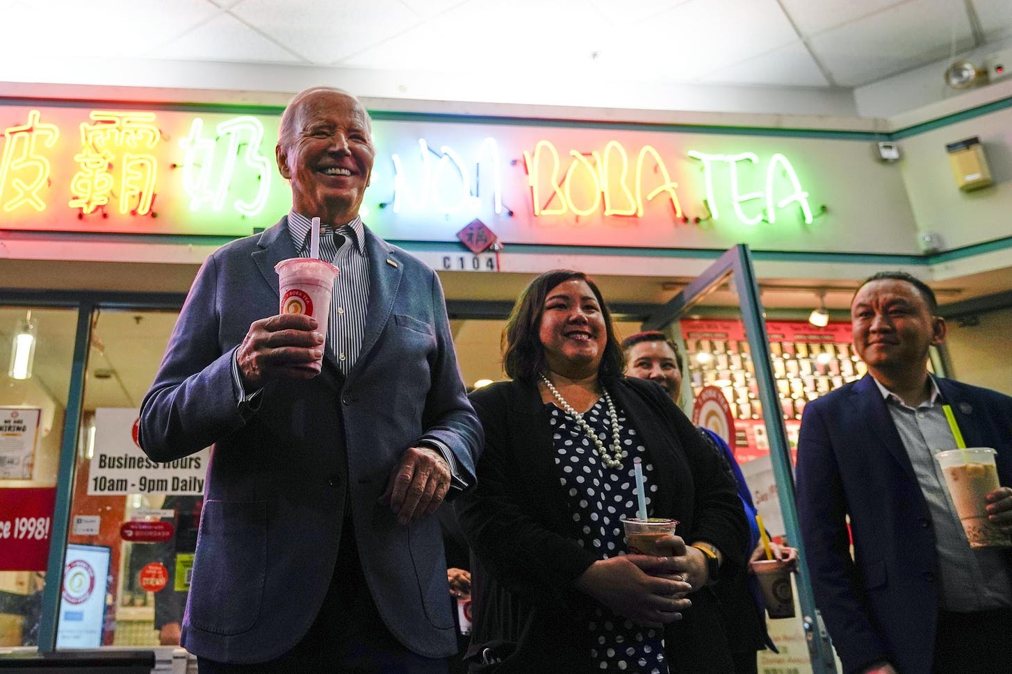 Joe Biden holding a Boba tea.
