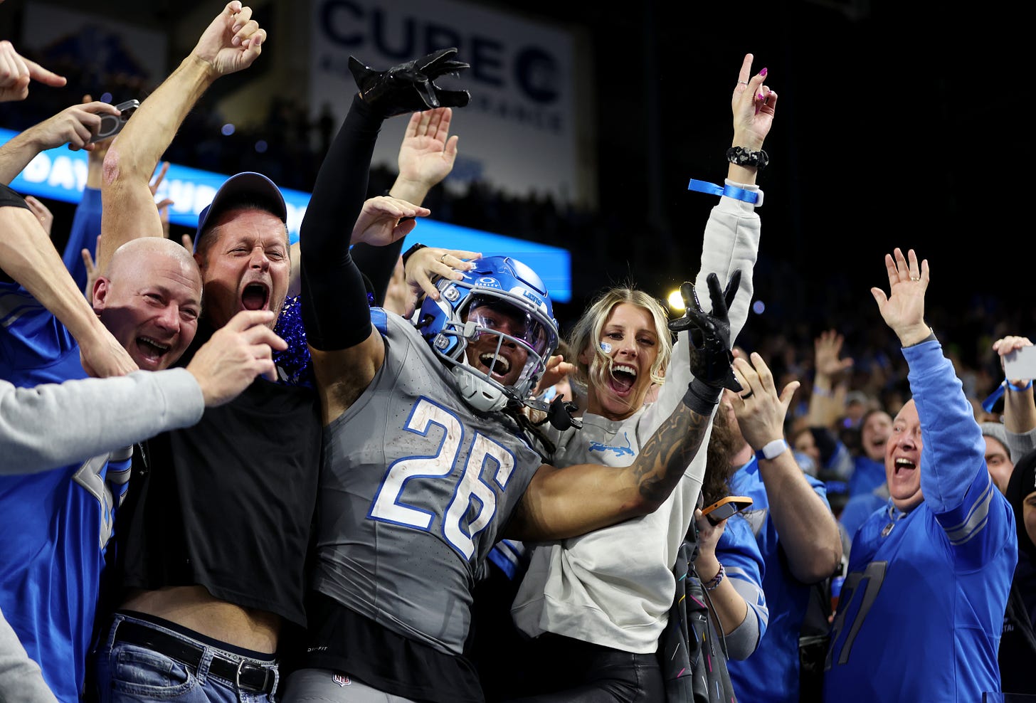 Shocked' woman lifts Detroit Lions' Gibbs into stands amid touchdown  celebration