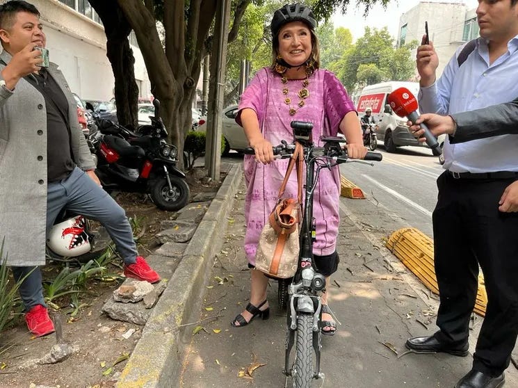 Xóchitl Gálvez riding her bicycle