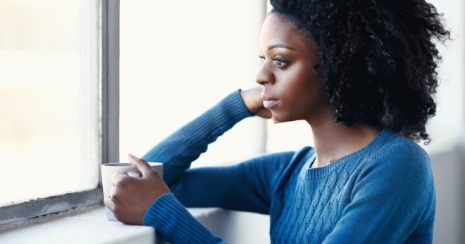 woman getting light for seasonal affective disorder sad