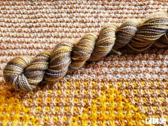 Koigu KPPM hand painted yarn in golds, greys and browns