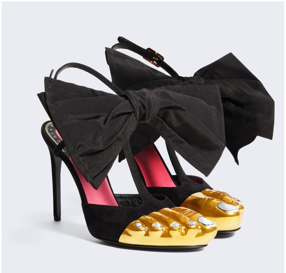 schiaparelli pumps with giant bows and fake gold feet
