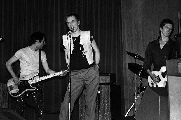 Sex Pistols performing in Manchester at Free Trade Hall in 1976, "The Gig That Changed the World."