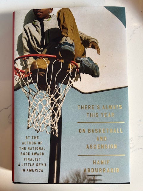 A child sits on top of a basketball hoop. The text reads There's Always This Year On Basketball and Ascension Hanif Abdurraqib by the author of the National Book Award Finalist A Little Devil in America