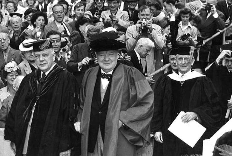 Winston Churchill walking to the podium to receive his honorary degree at Roddy Burdine Stadium on February 26, 1946. 