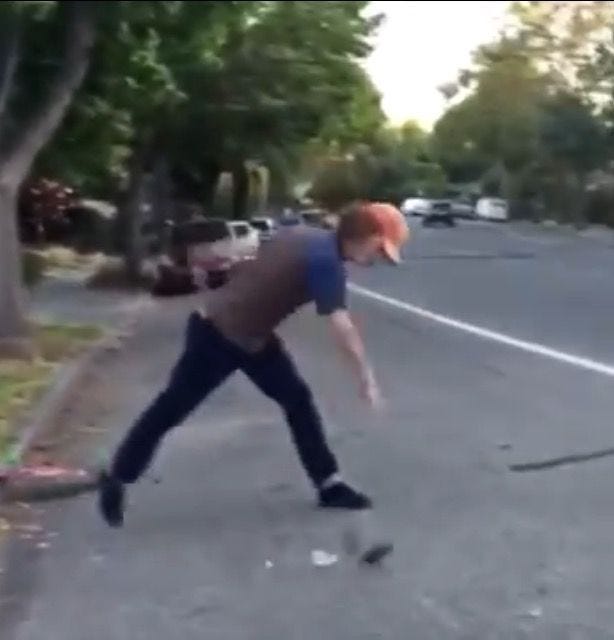 A screenshot of the guy from the "so no head?" vine smashing his phone on the pavement
