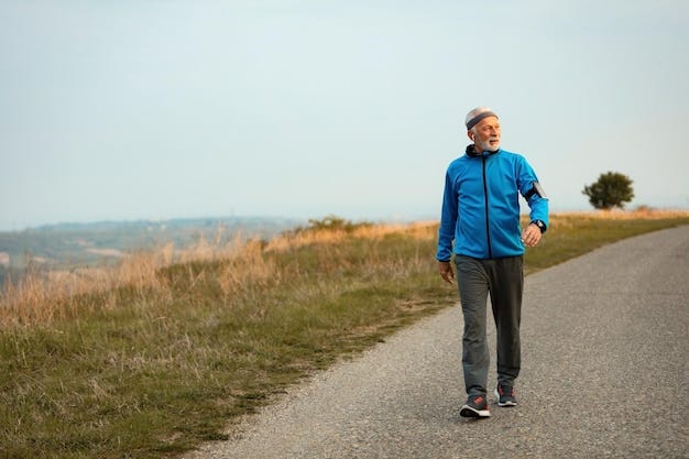 Full length of senior sportsman taking a walk in the morning and listening music over earphones in nature Copy space