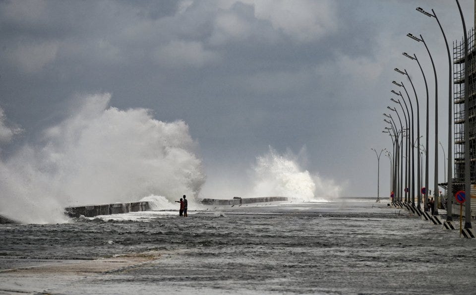 Waves crashed against the Malecon promenade in Havana