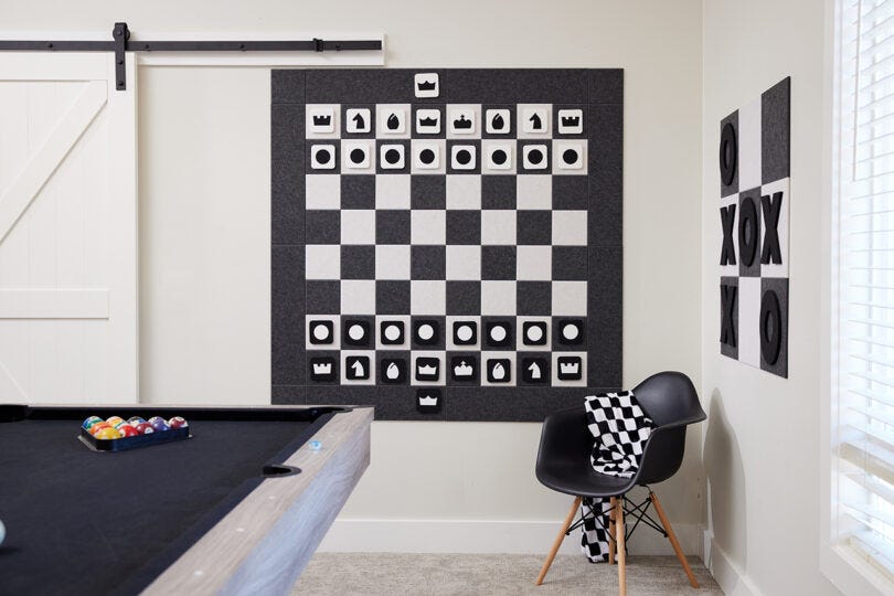 dark grey and white felt checkers game