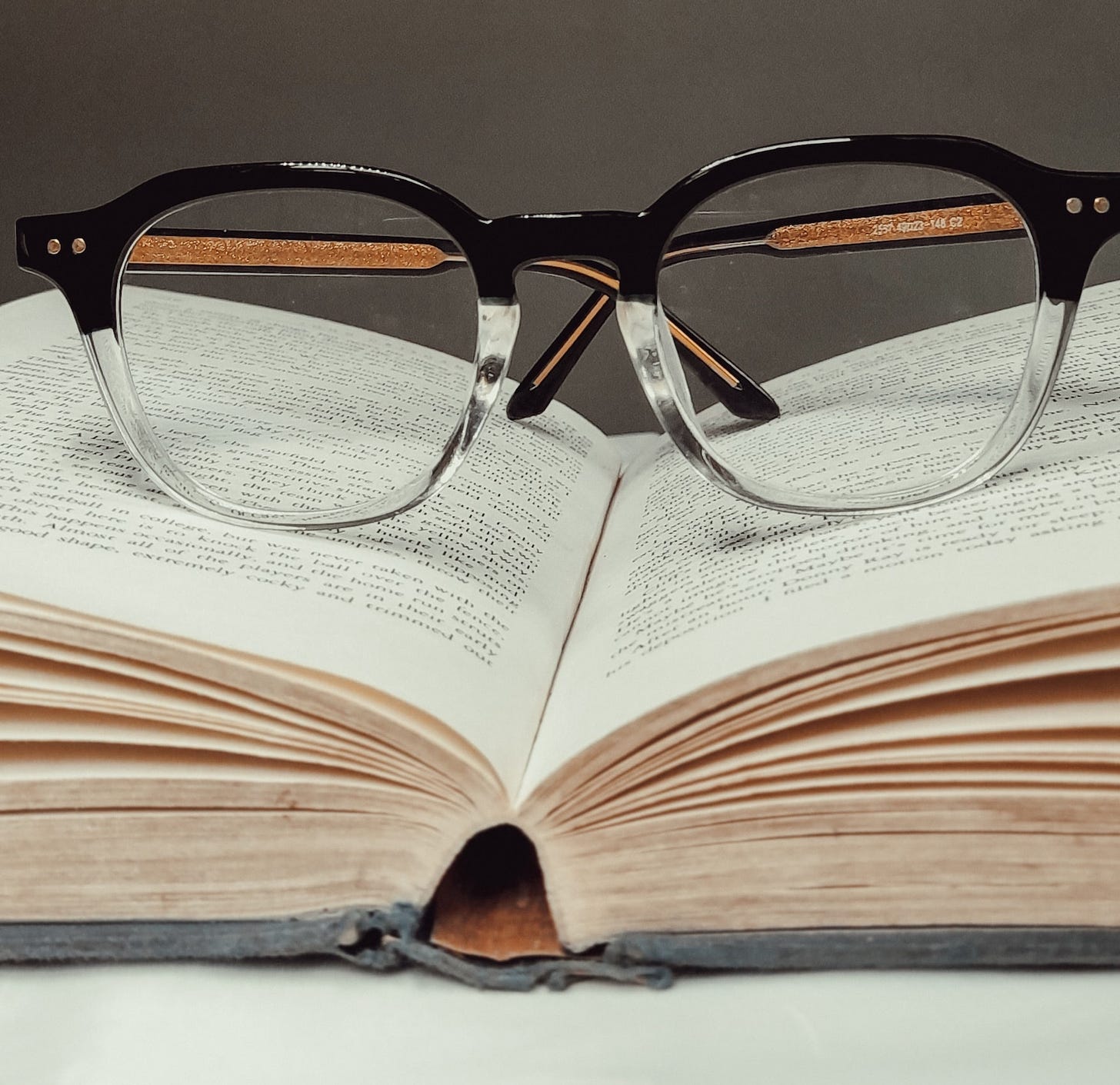 Glasses sitting on an open book