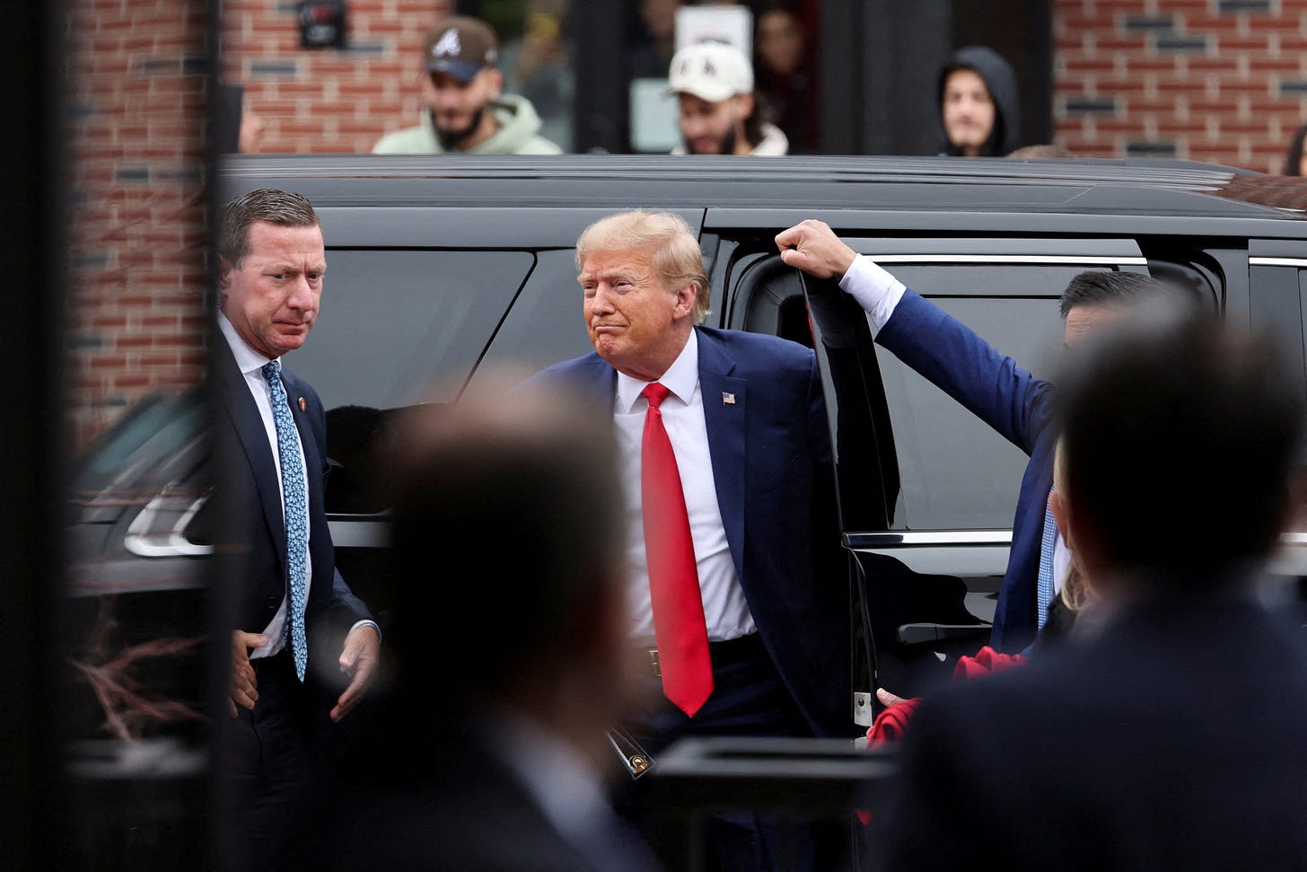 Former U.S. President and Republican presidential candidate Donald Trump attends a "commit to caucus" event, in Ankeny