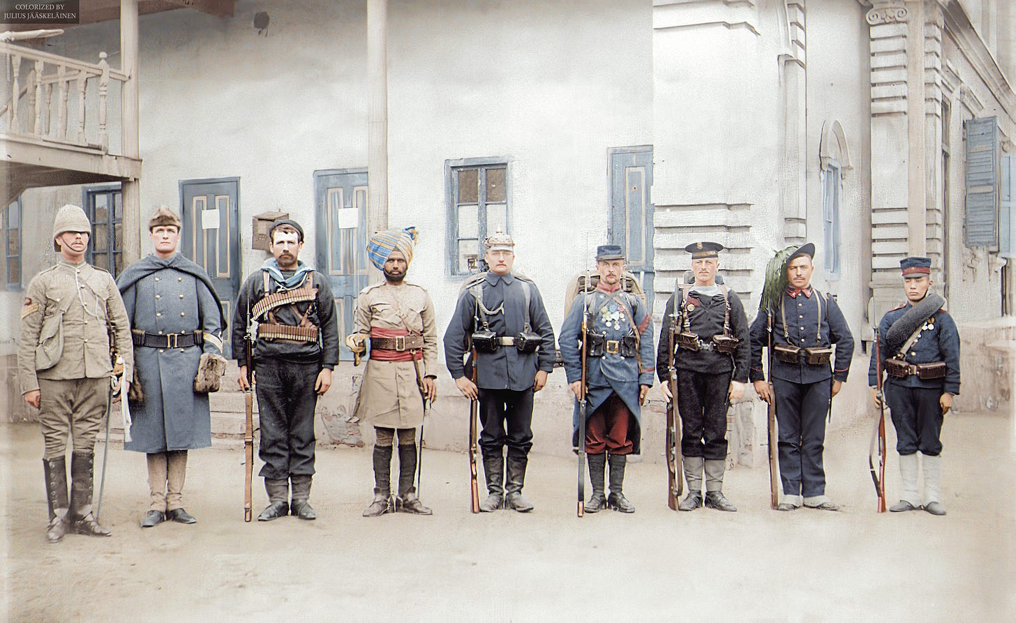 Troops of the Eight-Nation Alliance (except Russia) that fought against the Boxer Rebellion in China, 1900. From the left Britain, United States, Australia, India, Germany, France, Austria-Hungary, Italy, Japan. (49652330563).jpg