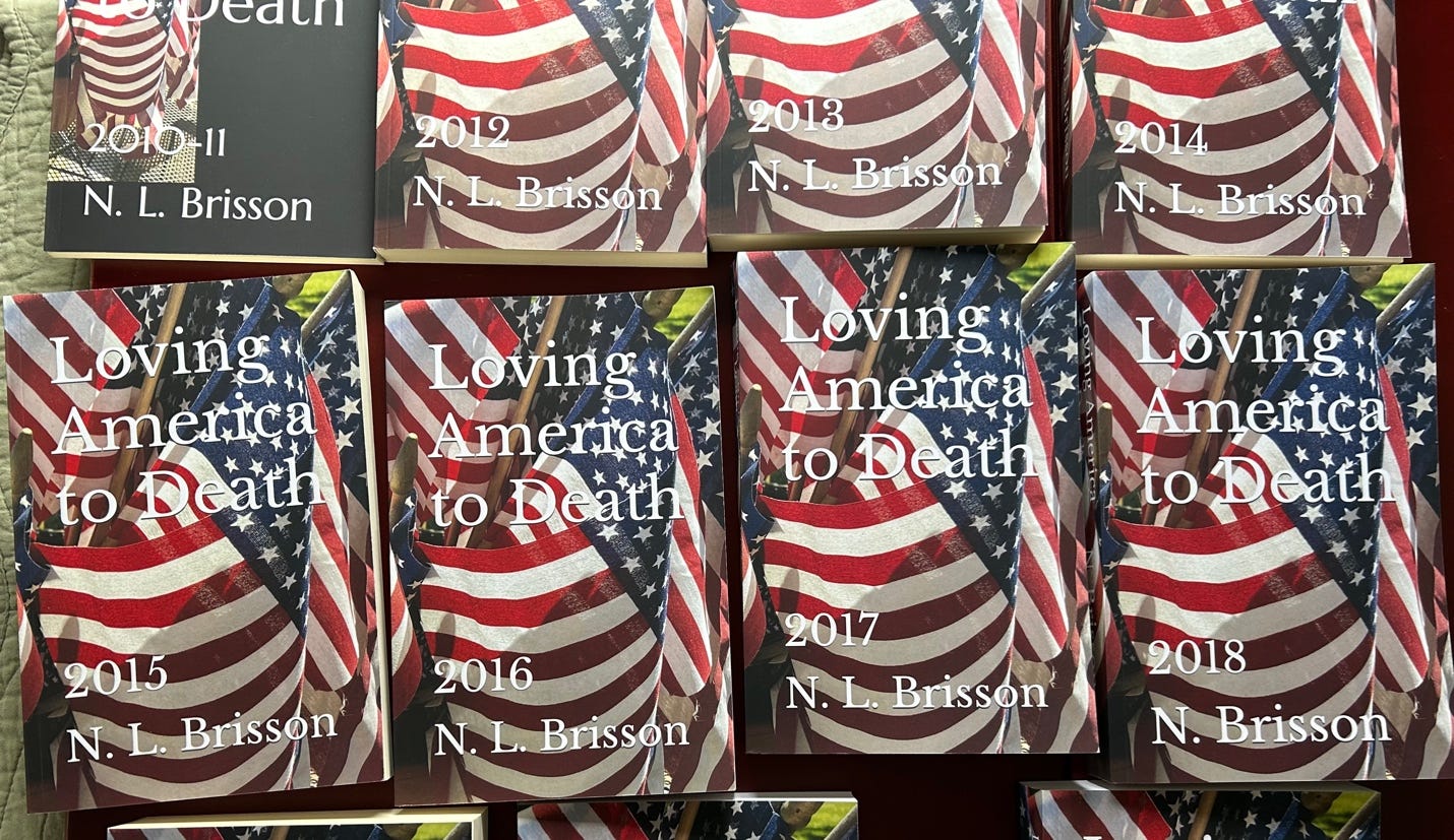 A group of books with american flags

Description automatically generated