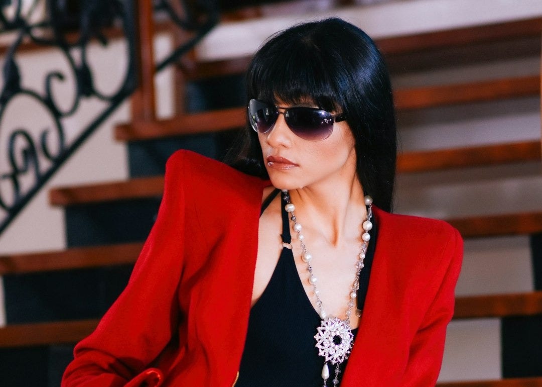 woman sitting on stair