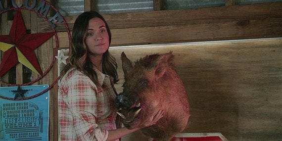 Geri with prize hog at fair on Walker.