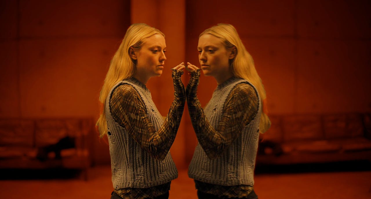 Dakota Fanning touching mirror