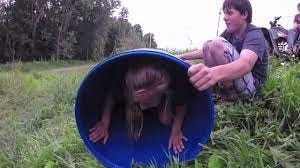 rolling down a hill in a barrel fail - YouTube