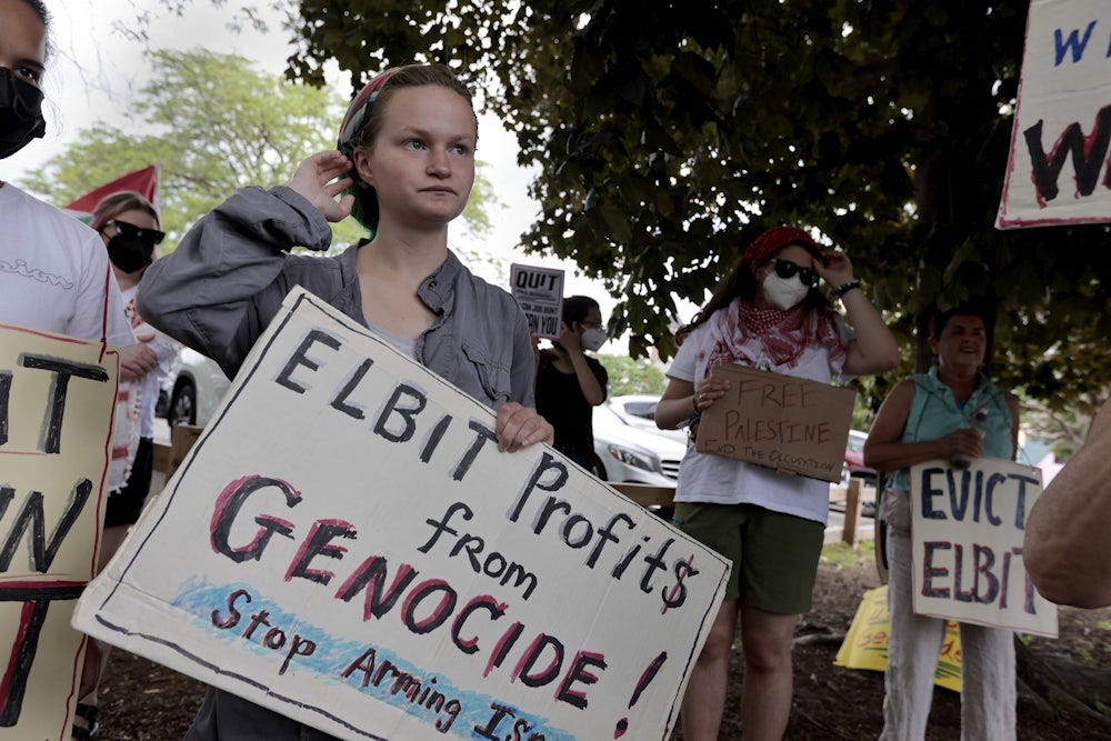 Students from the Massachusetts Institute of Technology protest outside the offices of Elbit Systems, a company that does work for the Israeli military.