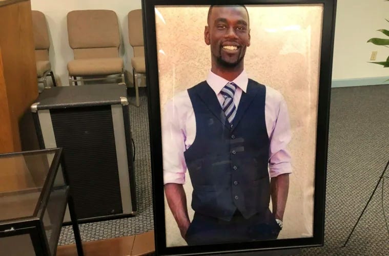 A portrait of Tyre Nichols is displayed at a memorial service for him on Tuesday, Jan. 17, 2023 in Memphis, Tenn. Nichols was killed during a traffic stop with Memphis Police on Jan. 7. (AP Photo/Adrian Sainz)