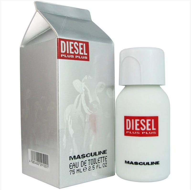 The packaging and a bottle of diesel plus plus fragrance. The packaging is shaped like a milk carton and has silver paint and the bottle is kind of the shape of a milk bottle