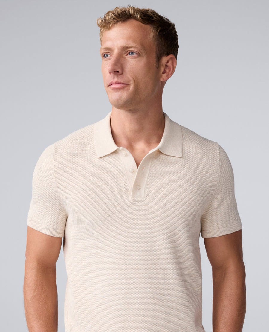 Front view of a man wearing Tech Linen Sweater Polo in Froth 