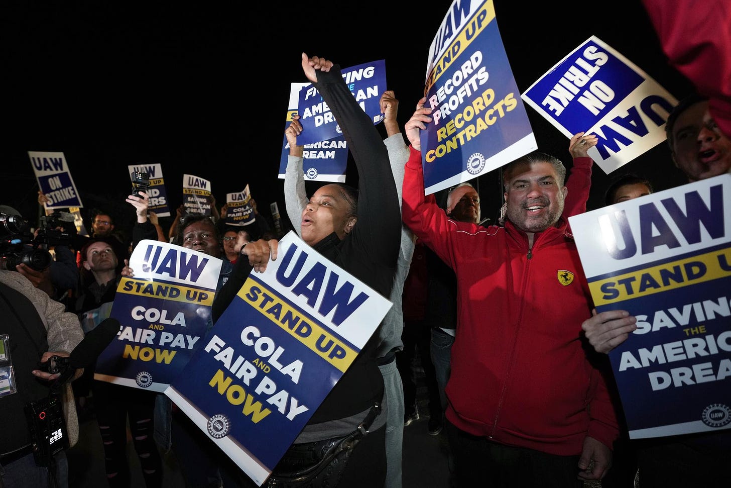 Striking United Auto Workers picket at Ford's Michigan Assembly Plant in Wayne, Mich.,