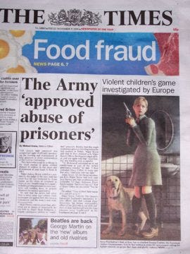 A picture of the front page of the UK-based newspaper, The Times. It features a screenshot of Jennifer and her dog Brown, alongside the headline "Violent video game investigated by Europe"