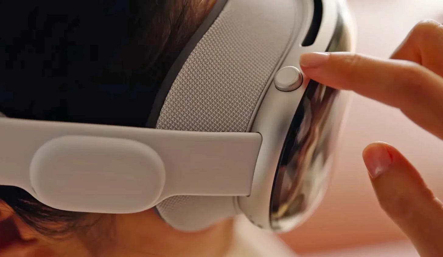 Apple Vision Pro will come with a spatial camera button for taking spatial photos and videos and an adjustable crown to toggle 'environments'. Apple Vision Pro will come with a spatial camera button for taking spatial photos and videos and an adjustable crown to toggle 'environments'.