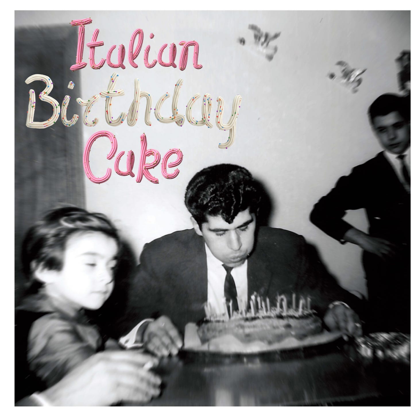A black and white photo of a man blowing out candles on an Italian birthday cake. "Italian Birthday Cake" is written in icing in the top left corner.