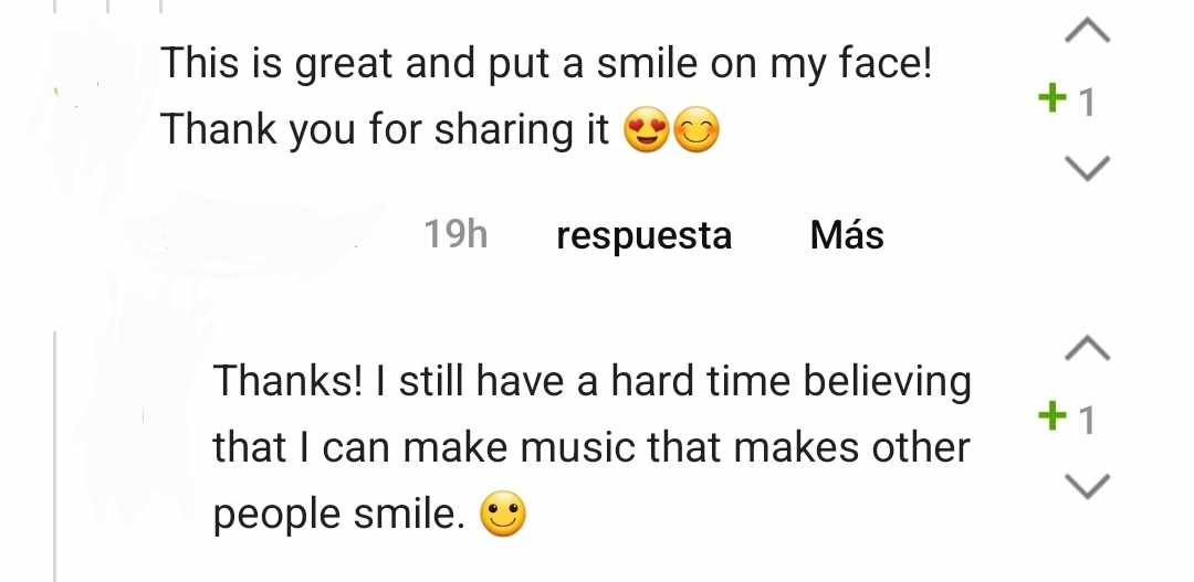 A screenshot of two comments taken from the Ultimate Guitar app. First comment says "This is great and put a smile on my face. Thank you for sharing it (happy emojis)". The reply says "Thanks! I still have a hard time believing that I can make music that makes other people smile. (smiley emoji)"