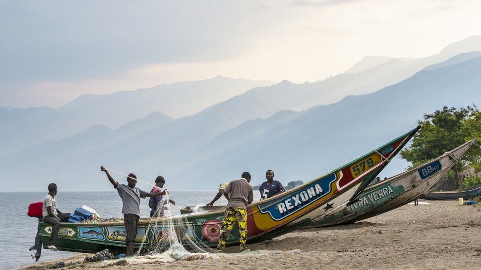 Fishermen on the shores of Lake Edward in the Democratic Republic of Congo