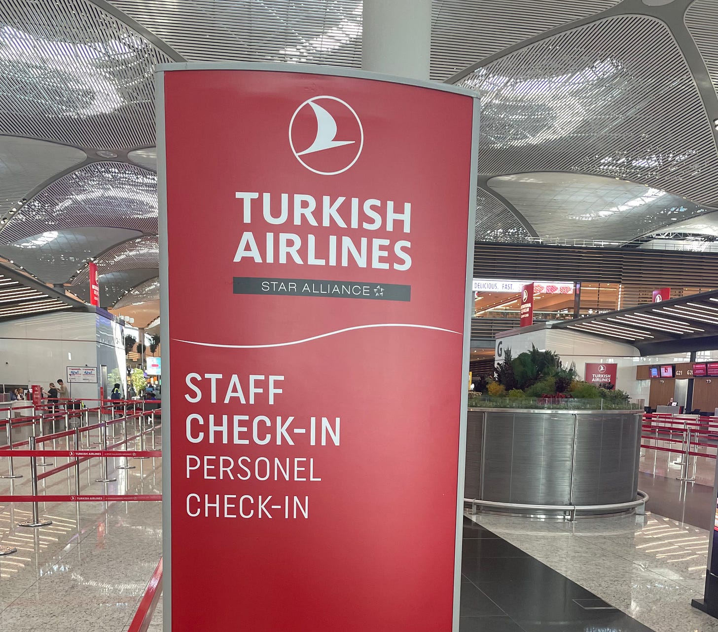 Turkish Airlines staff travel check-in at Istanbul Airport