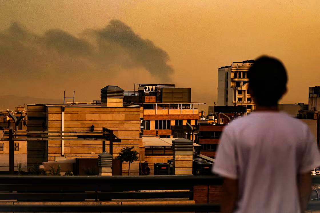 Smoke and dust rise from an Israeli airstrike in Tehran over the weekend