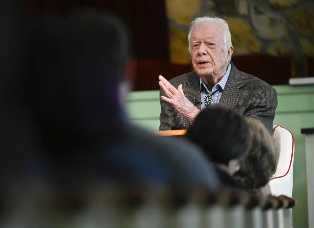 FILE - Former President Jimmy Carter teaches Sunday school at Maranatha Baptist Church, in Plains, Ga., Nov. 3, 2019. Well-wishes and fond remembrances for the former president continued to roll in Sunday, Feb. 19, 2023, a day after he entered hospice care at his home in Georgia. (AP Photo/John Amis, File)