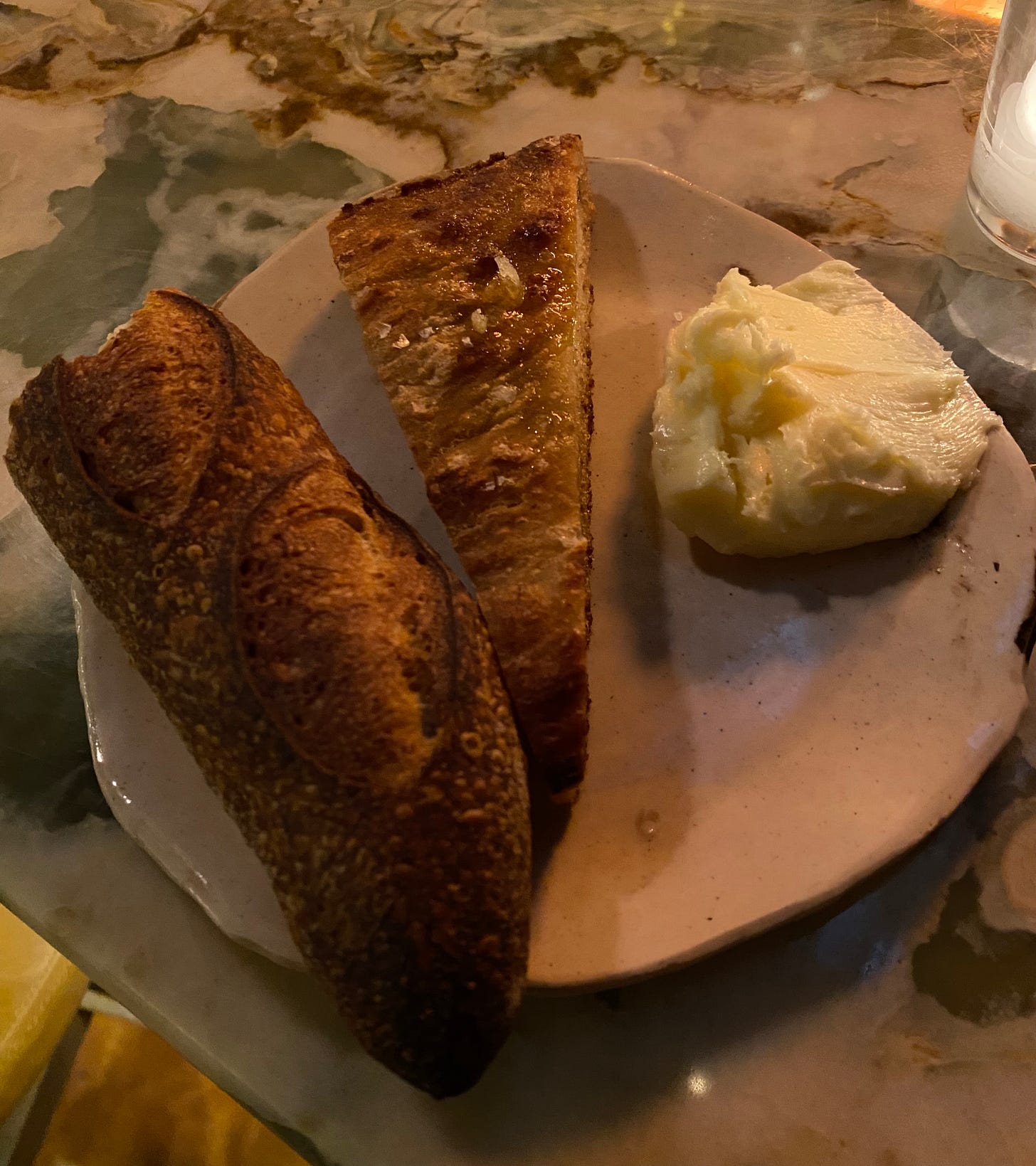 bread and butter on a plate at Foul Witch bar