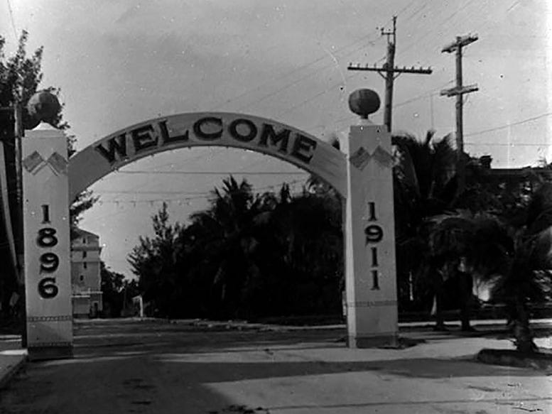 Cover: Welcome Arch just north of the intersection of NE Second Avenue and Flagler Street looking south in 1911.
