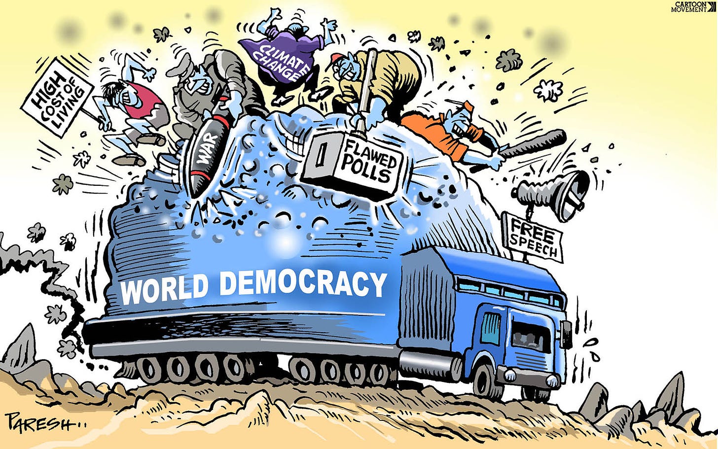 Cartoon showing a big truck labeled 'World democracies' that is under attack from people standing on its roof with big hammers labeled 'climate', 'flawed polls', 'climate change' and 'high cost of living'.