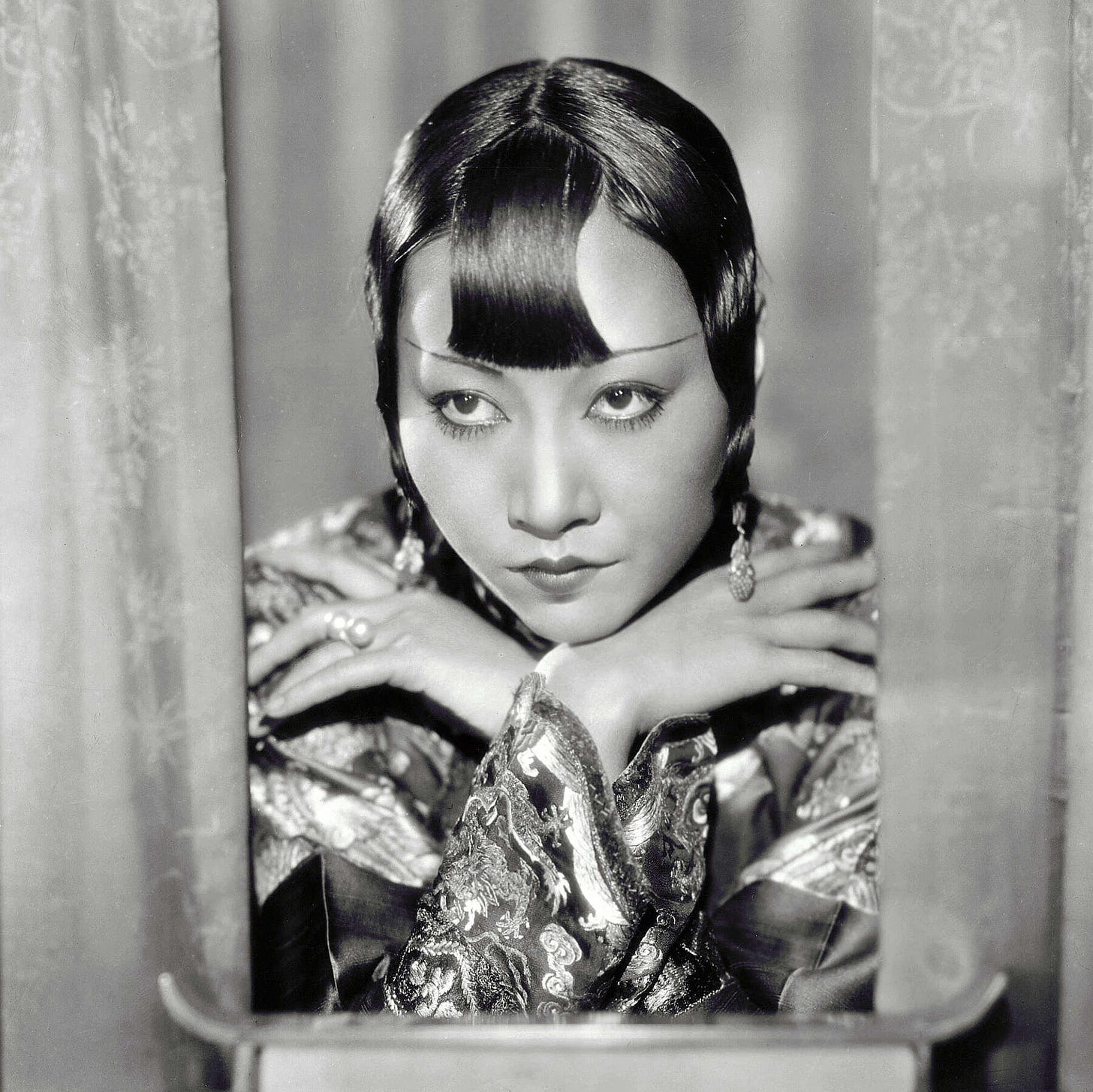 Anna May Wong dressed up as a Chinese courtesan in a publicity still for the film Shanghai Express