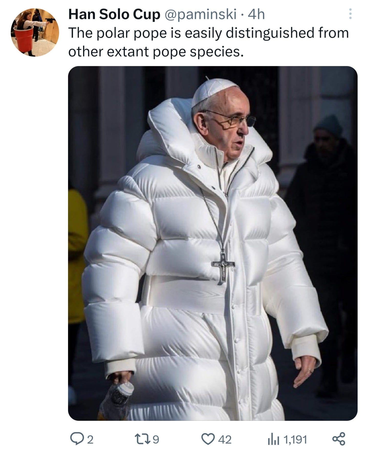 An AI-generated image of Pope Francis wearing a long white puffer coat with a crucifix on the outside