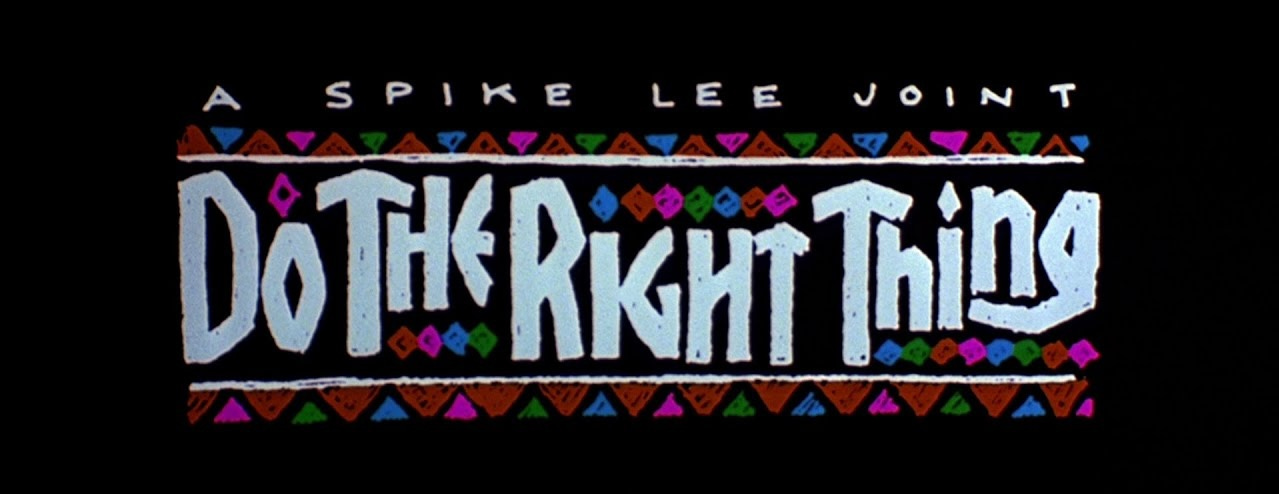 This image shows a promotional banner for Spike Lee's 1989 film Do the Right Thing. The movie's title appears surrounded by colorful, Kente-cloth diamonds and half-diamonds, while the words "A Spike Lee Joint" appear above the title.