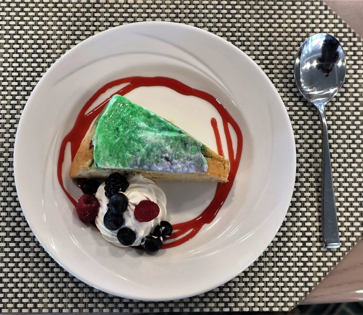 A Mardi Gras King Cake dessert in honor of our approach to New Orleans served aboard our American Cruise Lines riverboat. Photo by Victor Block