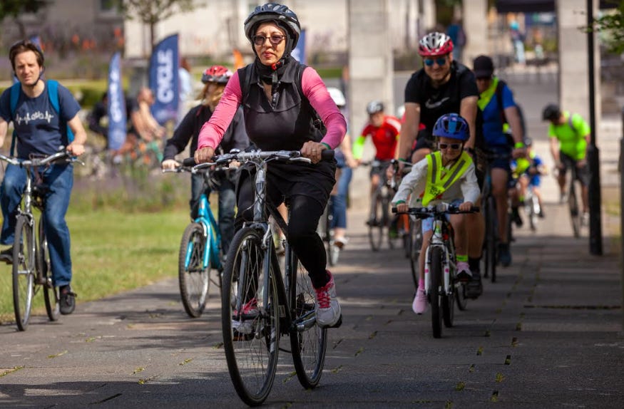 A group of people on a bike ride